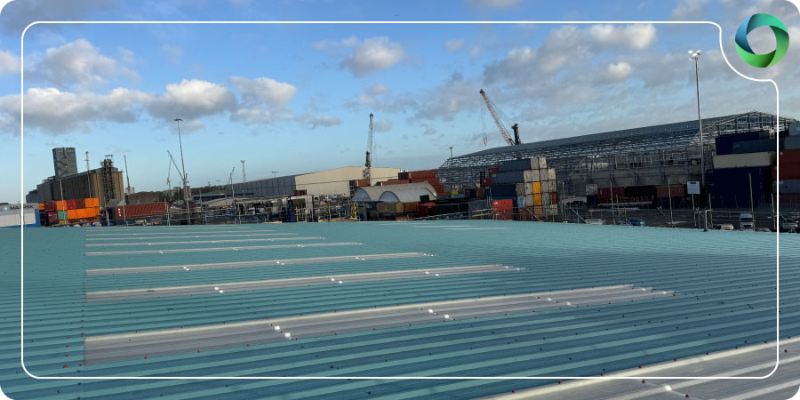 Asbestos cement roof and AIB above live industrial areas at Tilbury Docks